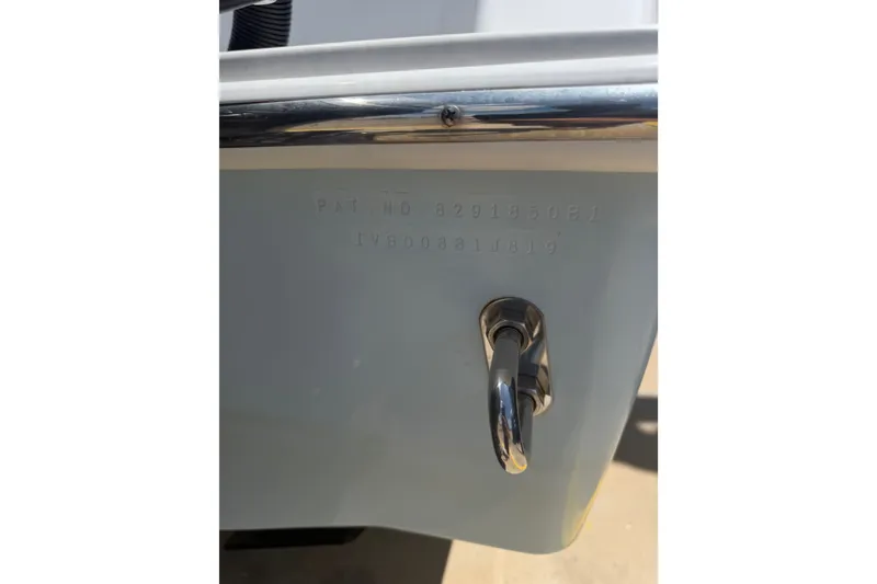 Slide: The Image of 2019 Invincible 36 Open Fisherman boat hull with patent number and metal fitting. - 66