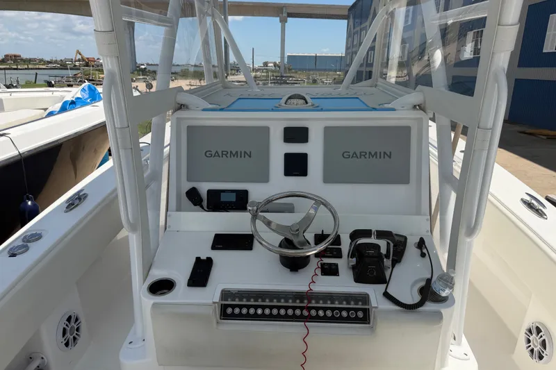 Slide: The Image of 2019 Invincible 36 Open Fisherman boat console with Garmin navigation systems. - 18