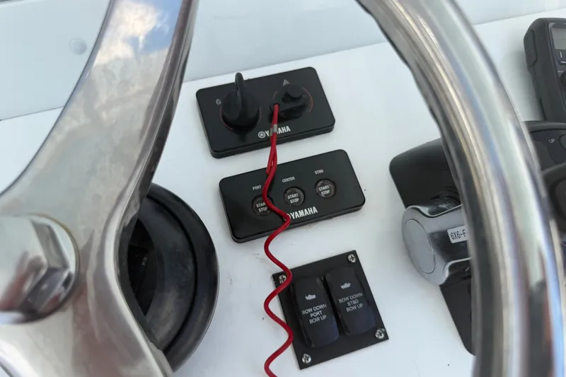 Slide: The Image of Control panel of a 2019 Invincible 36 Open Fisherman boat with Yamaha controls. - 57