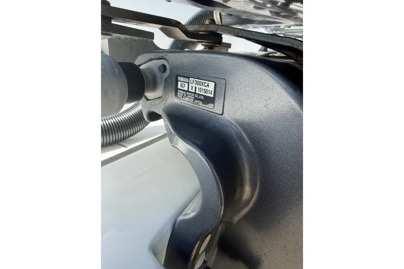 Slide: The Image of Close-up of Yamaha LF300XCA engine on 2019 Invincible 36 Open Fisherman boat. - 68