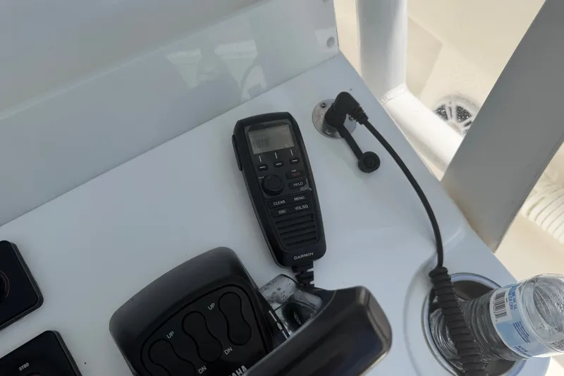 Slide: The Image of Control panel of a 2019 Invincible 36 Open Fisherman boat with Garmin radio. - 56