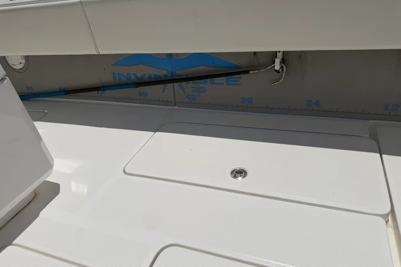 Slide: The Image of 2019 Invincible 36 Open Fisherman boat deck with measurement markings. - 62