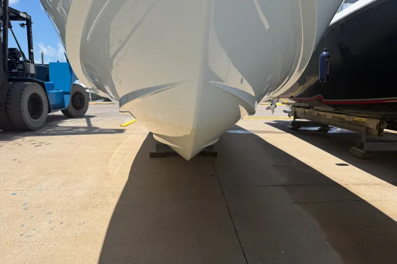 Slide: The Image of 2019 Invincible 36 Open Fisherman boat hull on dry dock, side view. - 5
