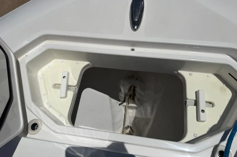 Slide: The Image of Open anchor compartment on 2019 Invincible 36 Open Fisherman boat. - 24
