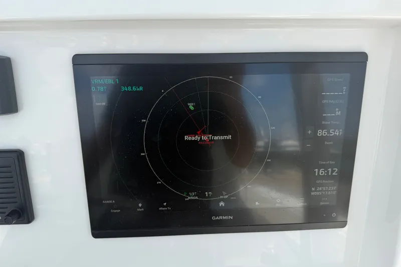 Slide: The Image of Garmin marine display on 2019 Invincible 36 Open Fisherman, showing radar and navigation data. - 58