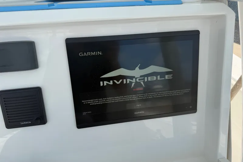 Slide: The Image of Garmin display on 2019 Invincible 36 Open Fisherman boat dashboard. - 49
