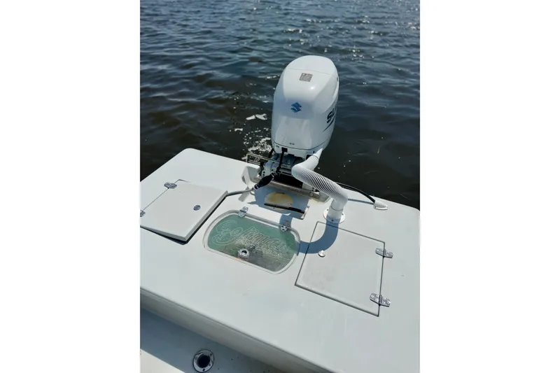 Slide: The Image of Boat with Suzuki outboard motor on water, featuring Homeade 15 model, 2024. - 17
