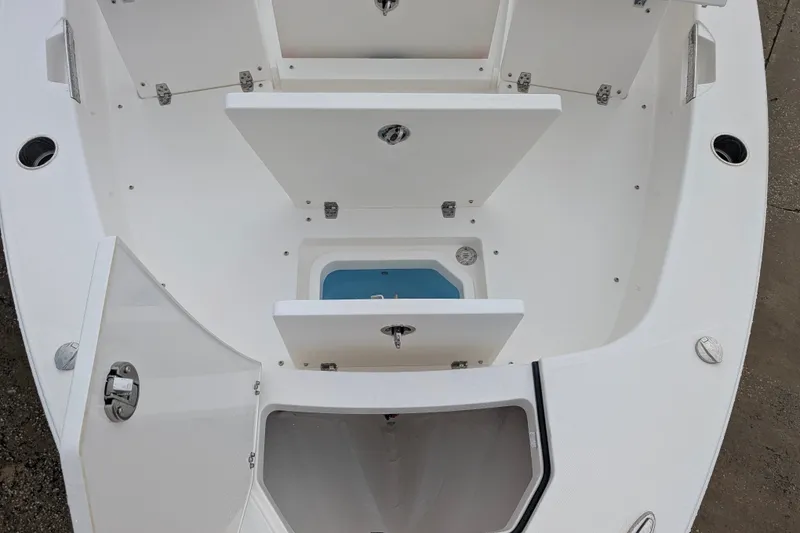 Slide: The Image of Pathfinder 2600 Hybrid 2027 boat storage compartments and livewell, showcasing spacious design. - 28