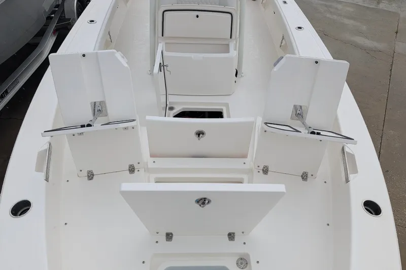 Slide: The Image of 2027 Pathfinder 2600 Hybrid boat interior with open storage compartments. - 29