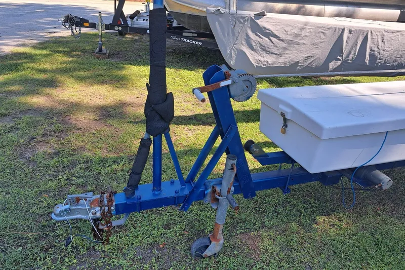 Slide: The Image of Trailer for 1989 Hobie Cat 21 sailboat with storage box on grassy area. - 8