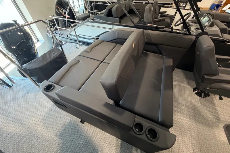 Slide: The Image of Interior of 2027 Evotti 521CS boat with sleek seating and cup holders. - 14