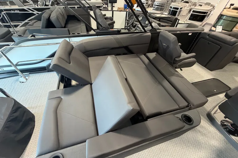 Slide: The Image of Luxurious seating on 2027 Evotti 521CS boat, featuring adjustable gray leather upholstery. - 17