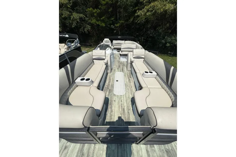 Slide: The Image of 2018 Crest Caribbean 250 SLS pontoon boat with spacious seating and modern design. - 6