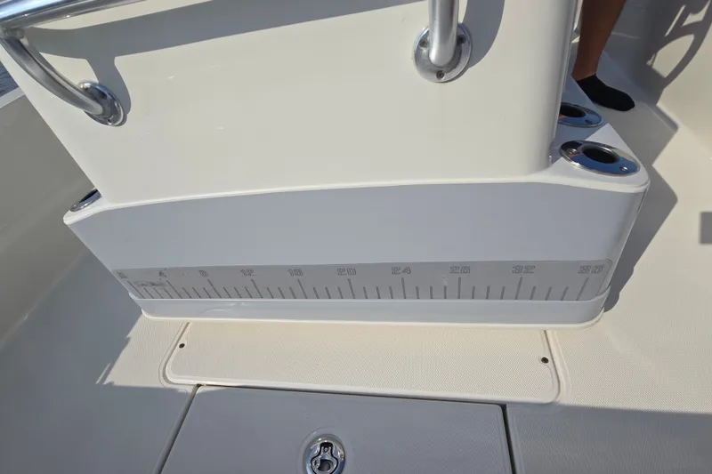 Slide: The Image of 2019 Ranger 2360 Bay Ranger boat deck with built-in measuring ruler and cup holders. - 20