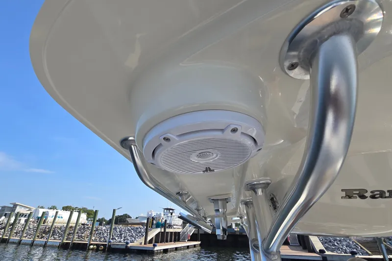 Slide: The Image of 2019 Ranger 2360 Bay Ranger boat with stainless steel fittings and speaker, docked at marina. - 15