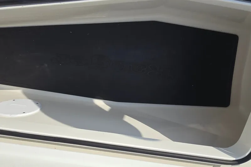 Slide: The Image of 2019 Ranger 2360 Bay Ranger boat interior detail with black panel. - 24