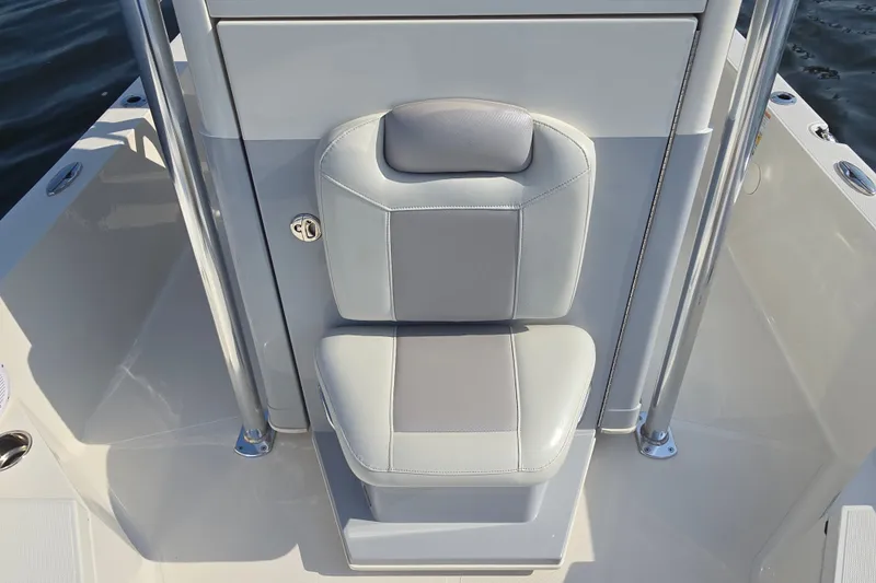 Slide: The Image of 2019 Ranger 2360 Bay Ranger boat seat with gray and white upholstery. - 17