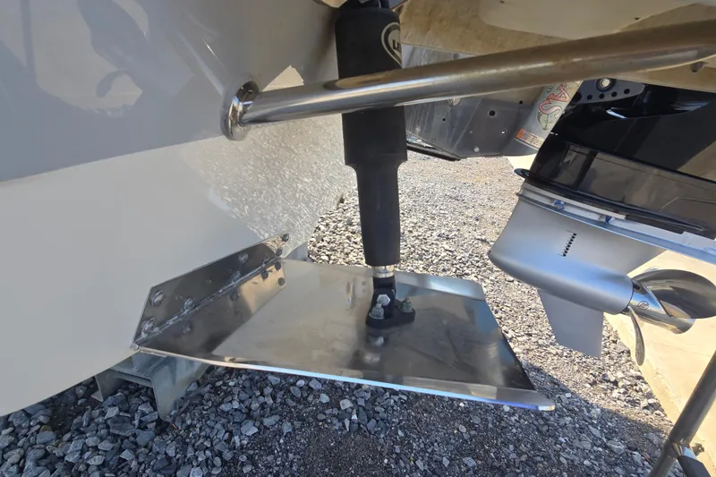 Slide: The Image of 2019 Ranger 2360 Bay Ranger boat trim tab and propeller detail. - 29