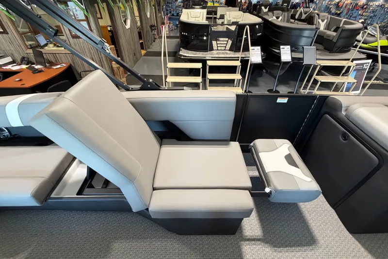 Slide: The Image of Luxurious seating in a 2027 Evotti 521QL boat showroom display. - 15