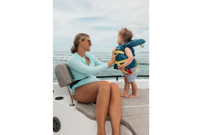 Slide: The Image of Woman and child on a 2027 Sea Hunt BX25FS boat, enjoying a day at sea. - 35