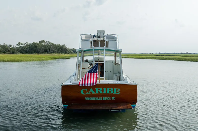 Slide: The Image of Vintage 1958 Albury Brothers boat "Caribe" on serene water, Wrightsville Beach, NC. - 24