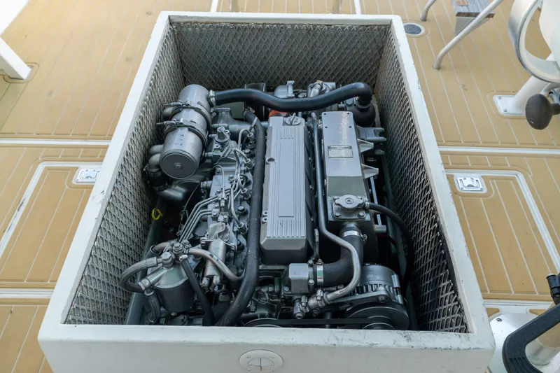 Slide: The Image of 1958 Albury Brothers boat engine in a compartment on deck. - 67