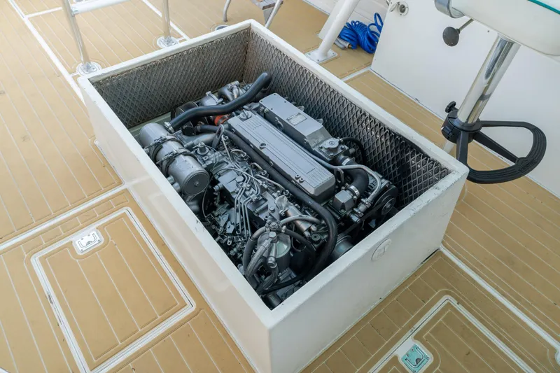 Slide: The Image of Engine compartment of a 1958 Albury Brothers boat, showcasing detailed mechanical components. - 66