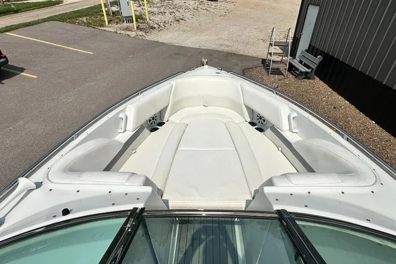 Slide: The Image of 2004 Formula 260 Bowrider boat with spacious seating and sleek design. - 15