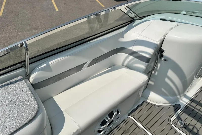 Slide: The Image of 2004 Formula 260 Bowrider interior with white seating and sleek design. - 9