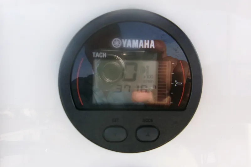 Slide: The Image of Yamaha tachometer on 2022 Key West 189 FS boat dashboard. - 15