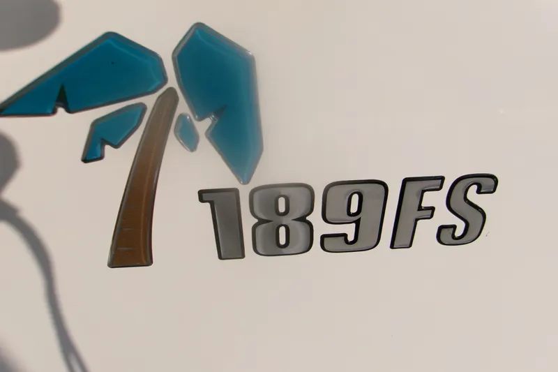 Slide: The Image of Key West 189 FS 2022 model logo with palm tree design. - 23