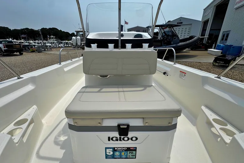Slide: The Image of 2027 Boston Whaler 170 Montauk boat interior with Igloo cooler and seating. - 15