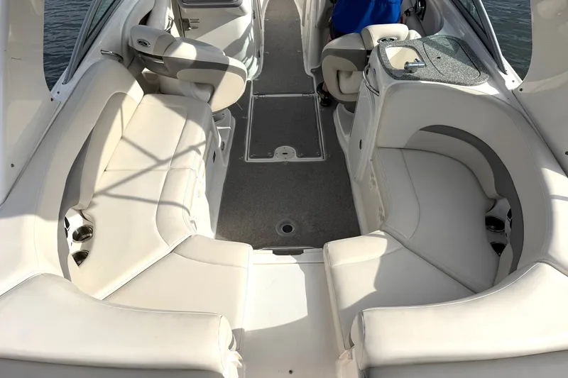 Slide: The Image of 2008 Chaparral 256 SSi boat interior with spacious seating and modern amenities. - 30