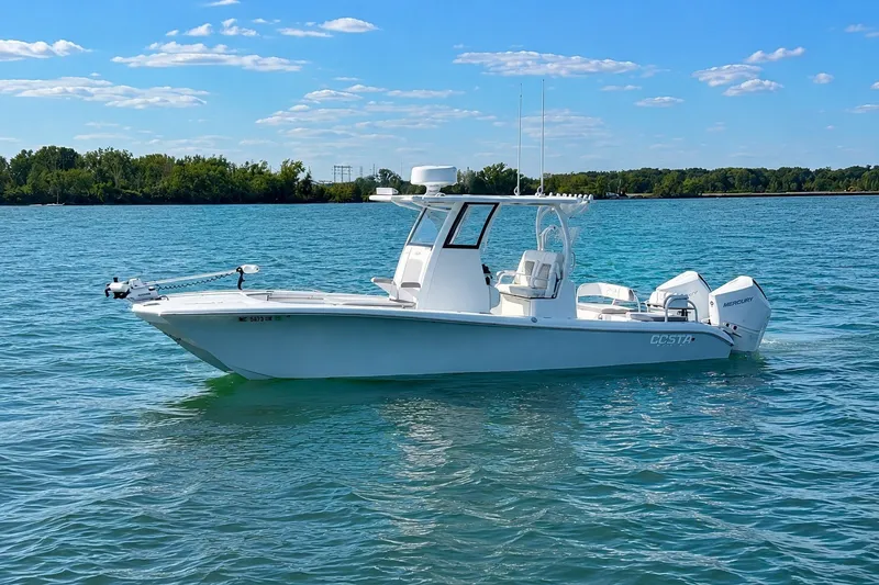 The Image of 2024 Costa Custom Boats 264HC on serene blue water under clear sky. - 1