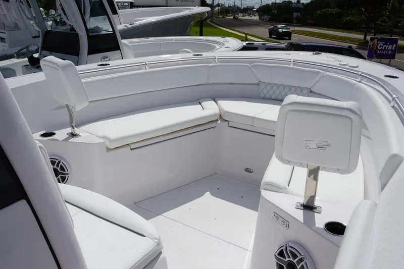 Slide: The Image of 2027 Sportsman Heritage 261 Center Console boat with spacious seating and modern design. - 23