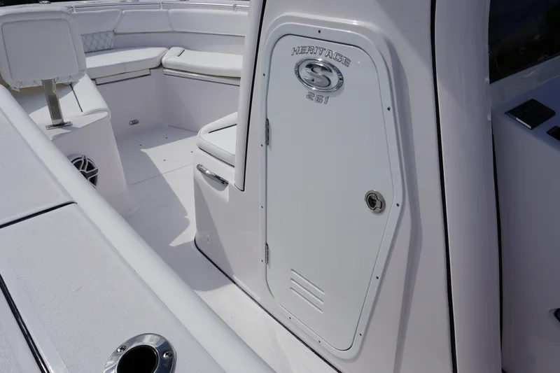 Slide: The Image of 2027 Sportsman Heritage 261 Center Console interior with seating and storage. - 26