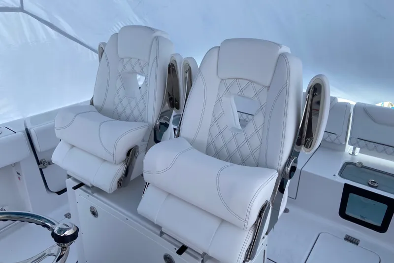 Slide: The Image of Luxury seating on 2027 Sportsman Heritage 261 Center Console boat. - 4