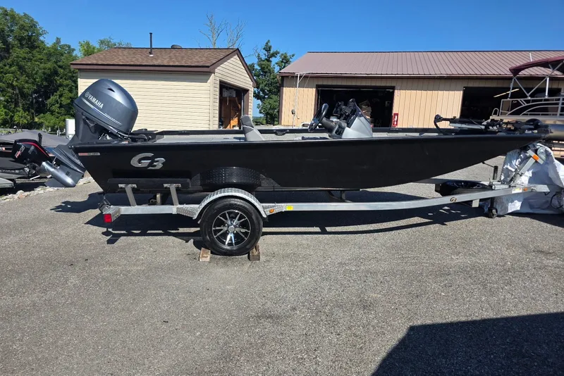 The Image of 2020 G3 Sportsman 1710 boat on trailer with Yamaha motor, parked outdoors. - 0