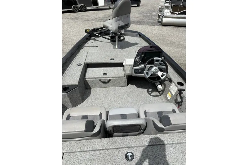 Slide: The Image of 2020 G3 Sportsman 1710 boat interior with steering wheel and seating. - 10