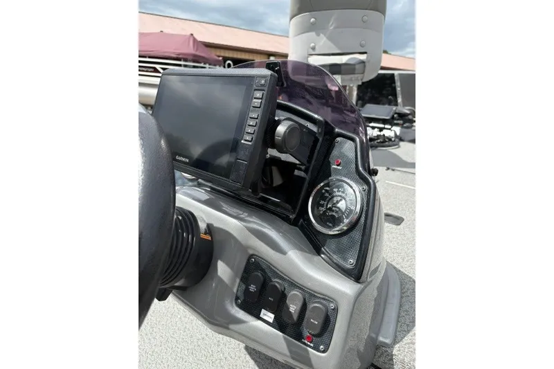 Slide: The Image of Dashboard of 2020 G3 Sportsman 1710 boat with Garmin display and controls. - 13