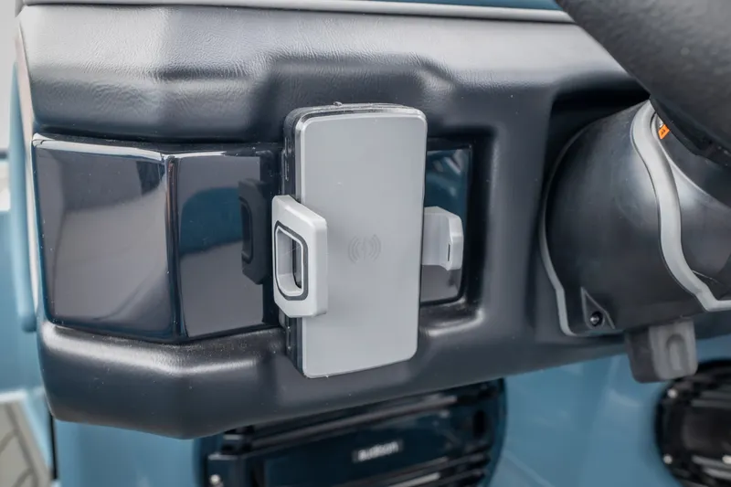 Slide: The Image of Dashboard of 2026 ATX Surf Boats 22 Type-S with phone holder. - 15