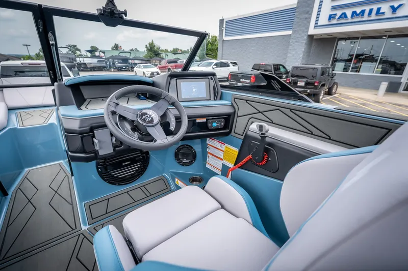 Slide: The Image of Interior of 2026 ATX Surf Boats 22 Type-S, featuring modern dashboard and steering wheel. - 13