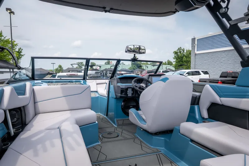 Slide: The Image of Interior of 2026 ATX Surf Boats 22 Type-S, featuring modern seating and dashboard design. - 8