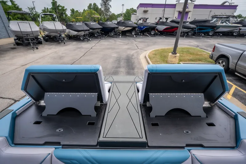 Slide: The Image of 2026 ATX Surf Boats 22 Type-S rear view, showcasing storage compartments and sleek design. - 29