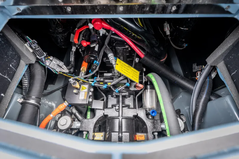 Slide: The Image of Engine compartment of 2026 ATX Surf Boats 22 Type-S, showcasing wiring and components. - 28