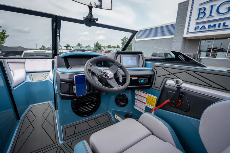 Slide: The Image of 2026 ATX Surf Boats 22 Type-S interior with modern dashboard and steering wheel. - 16