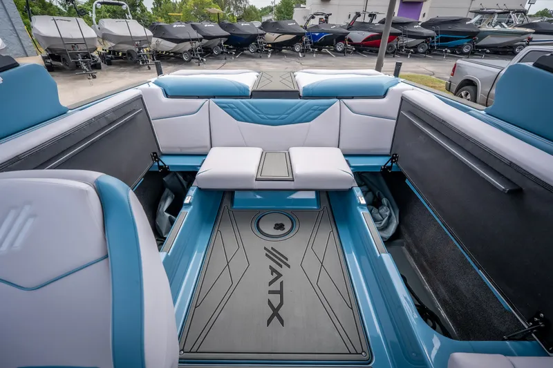 Slide: The Image of Interior of 2026 ATX Surf Boats 22 Type-S, featuring sleek seating and storage compartments. - 26