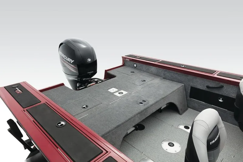 Slide: The Image of The image shows the rear of a 2017 Tracker Targa V-18 Combo boat with a Mercury engine. - 15