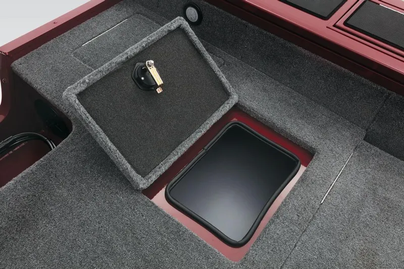 Slide: The Image of A gray carpeted storage area on a boat with an open hatch. - 36