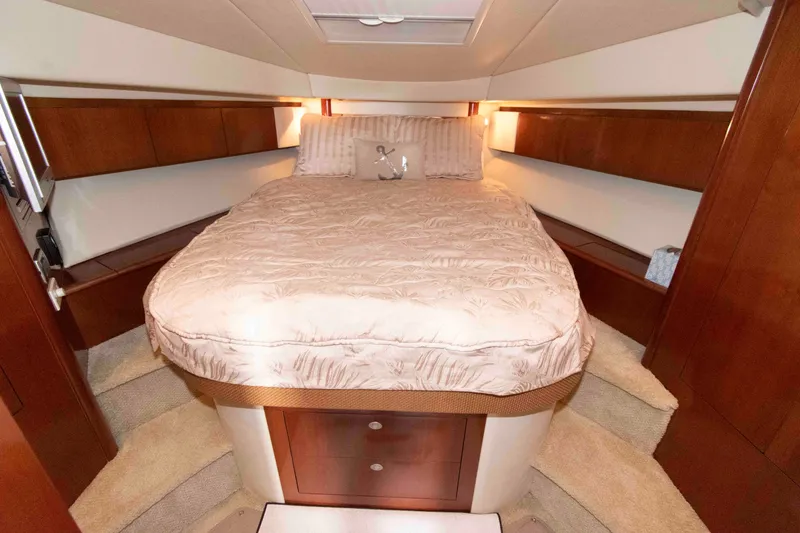 Slide: The Image of Luxurious bedroom interior of 2006 Sea Ray 44 Sedan Bridge yacht. - 19